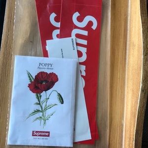 Supreme poppy seed/sticker pack